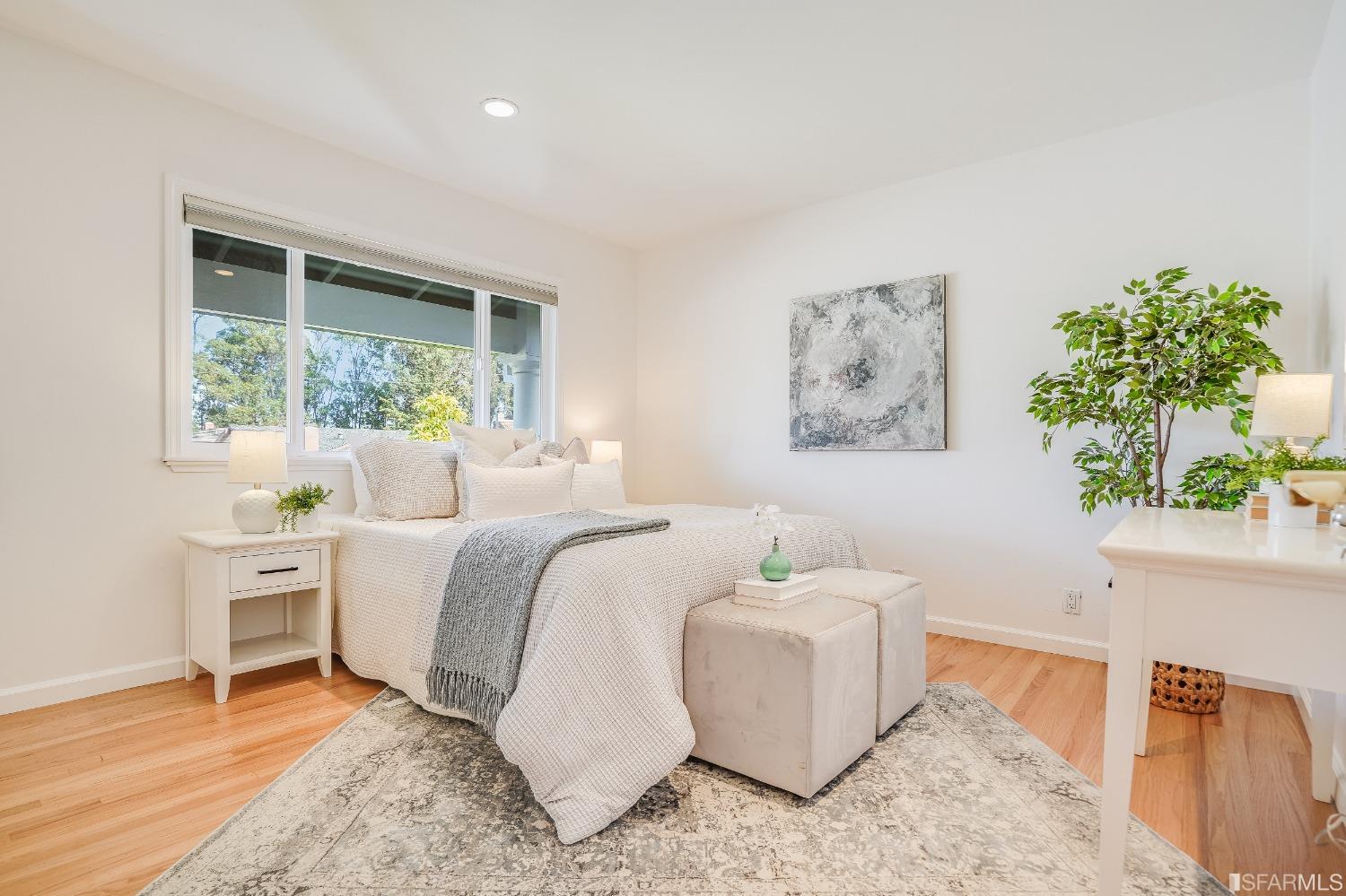 1838 Whitecliff Way San Mateo, CA 94402 - Photo 28 of 56 a room with a bed and a couch