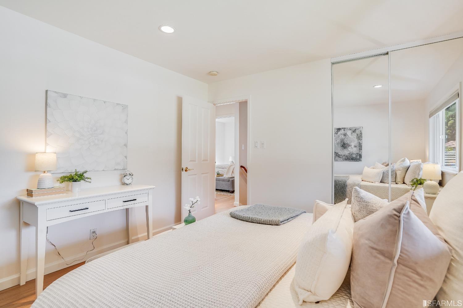 1838 Whitecliff Way San Mateo, CA 94402 - Photo 29 of 56 a bedroom with a bed and a lamp