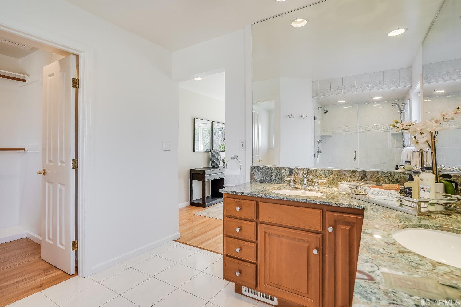 1838 Whitecliff Way San Mateo, CA 94402 - Photo 41 of 56 a bathroom with a granite countertop sink mirror and double