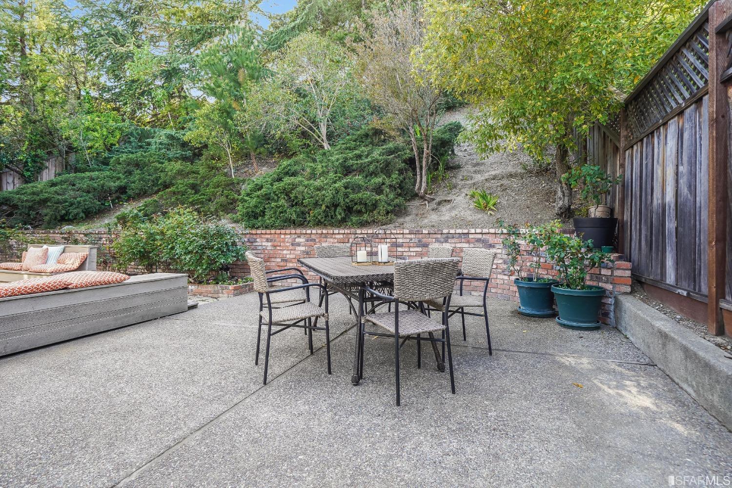 1838 Whitecliff Way San Mateo, CA 94402 - Photo 55 of 56 a view of a patio with table and chairs and potted plants