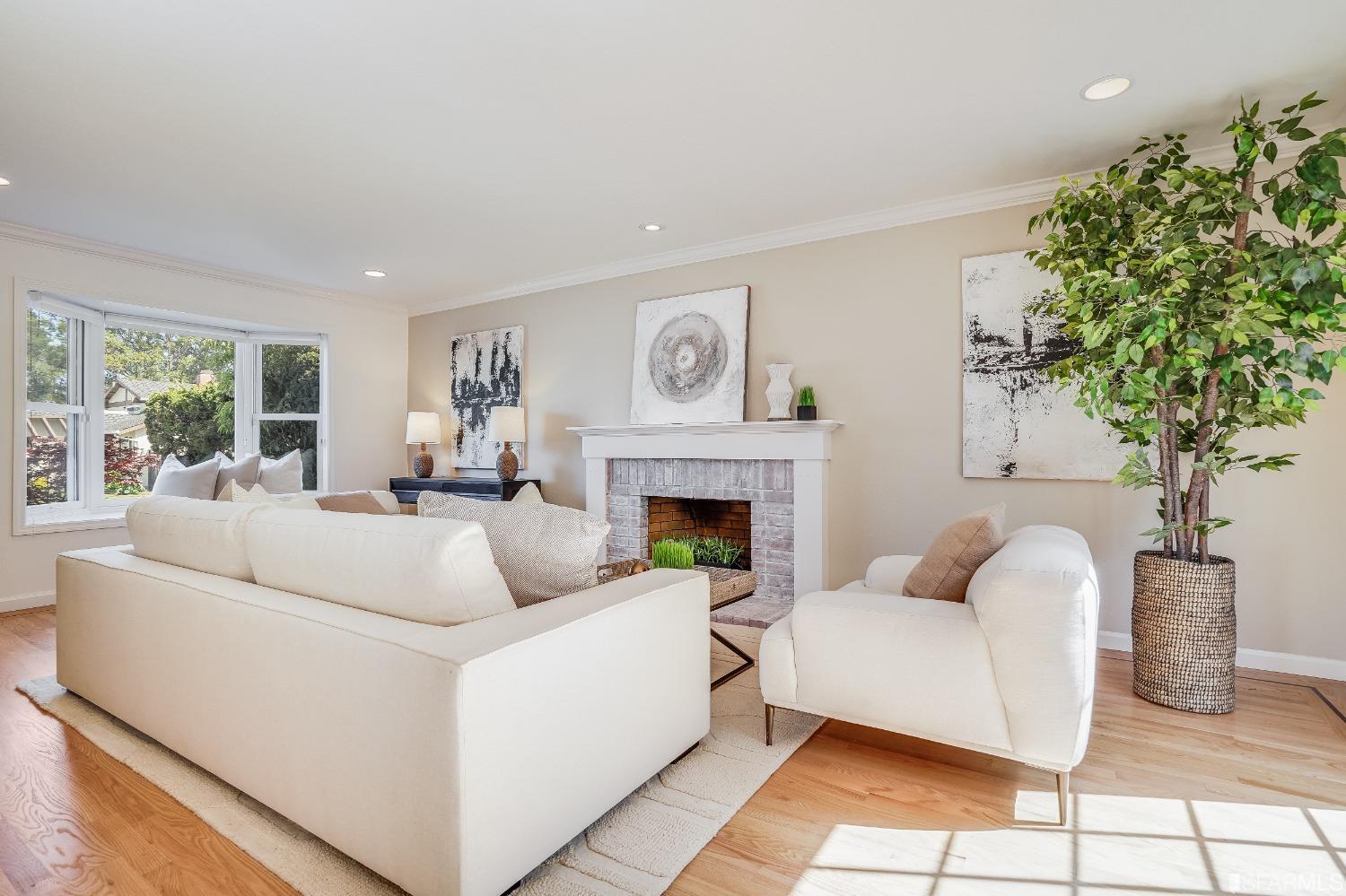 1838 Whitecliff Way San Mateo, CA 94402 - Photo 9 of 56 a living room with furniture and a fireplace