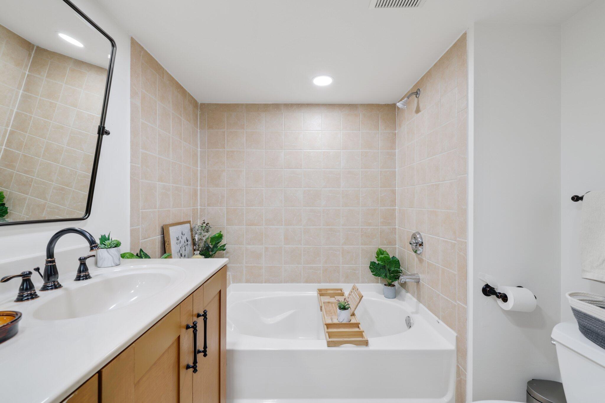 3143 Clint Moore Road, Unit 107 Boca Raton, FL 33496 - Photo 22 of 40 Tub in Primary Bath