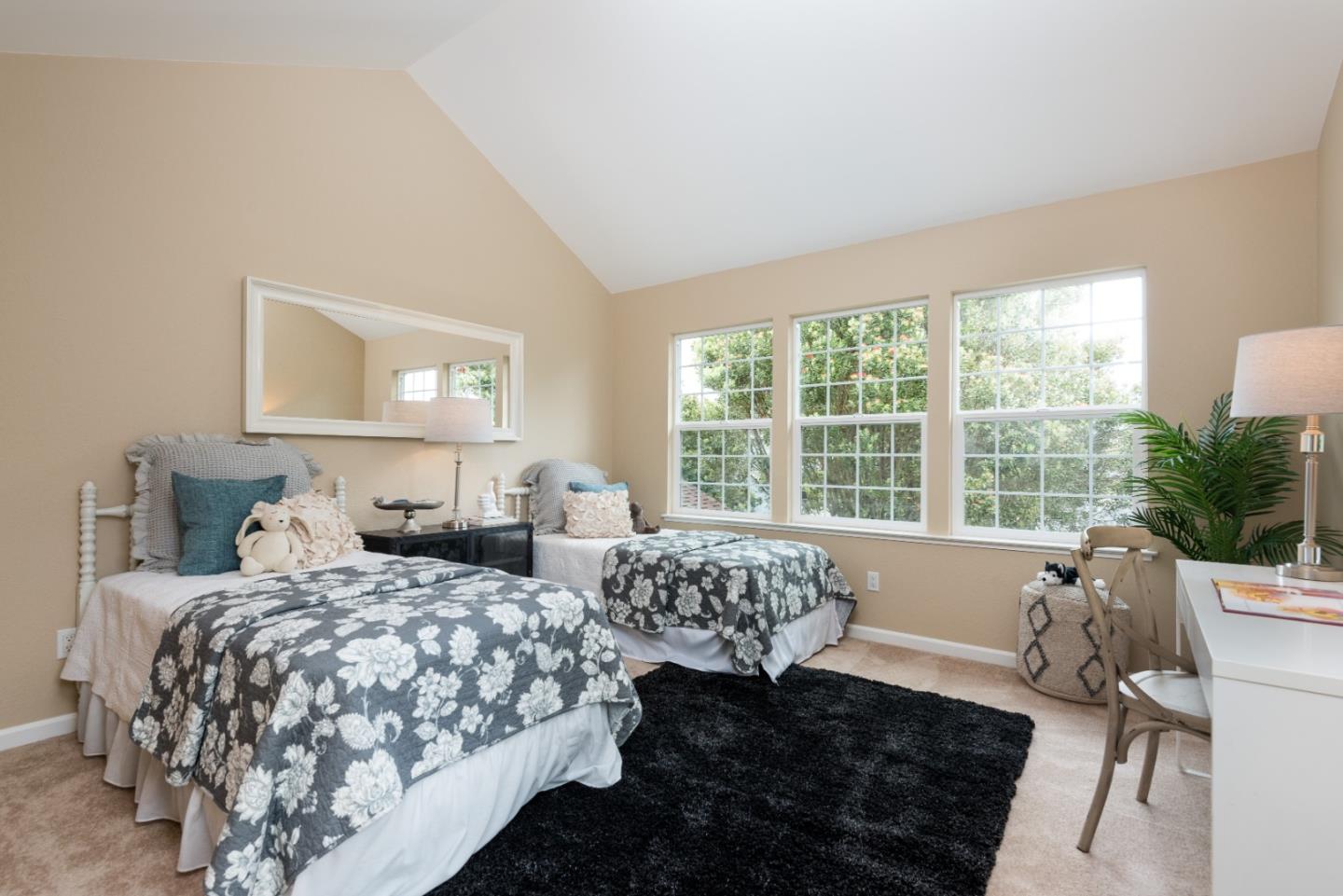 6 Muirfield Road Half Moon Bay, CA 94019 - Photo 13 of 25 a bedroom with two beds bed and a large window
