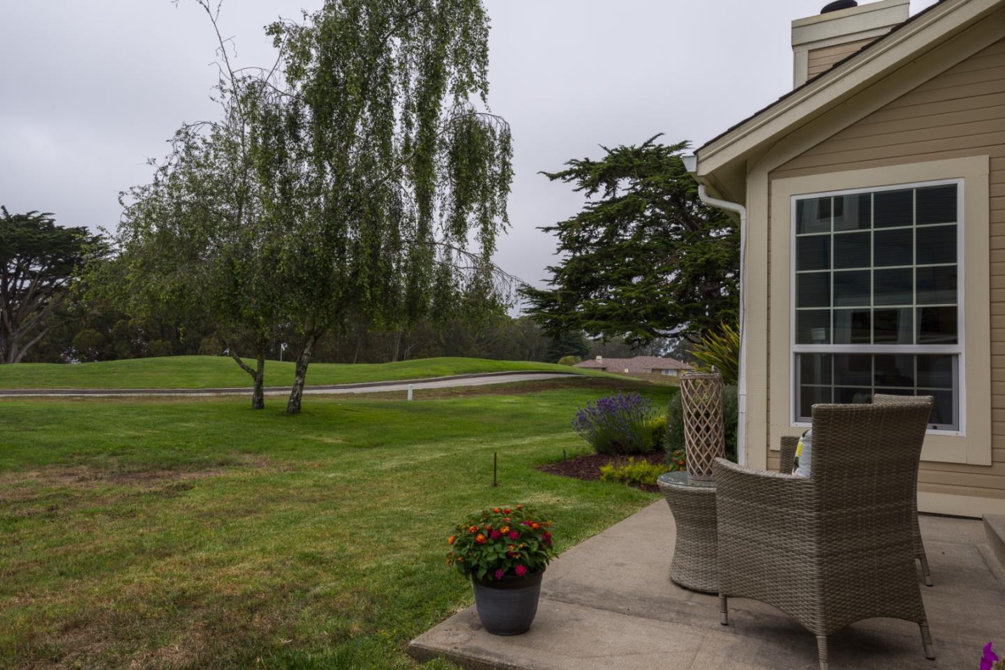 6 Muirfield Road Half Moon Bay, CA 94019 - Photo 19 of 25 a view of a garden with plants and a garden