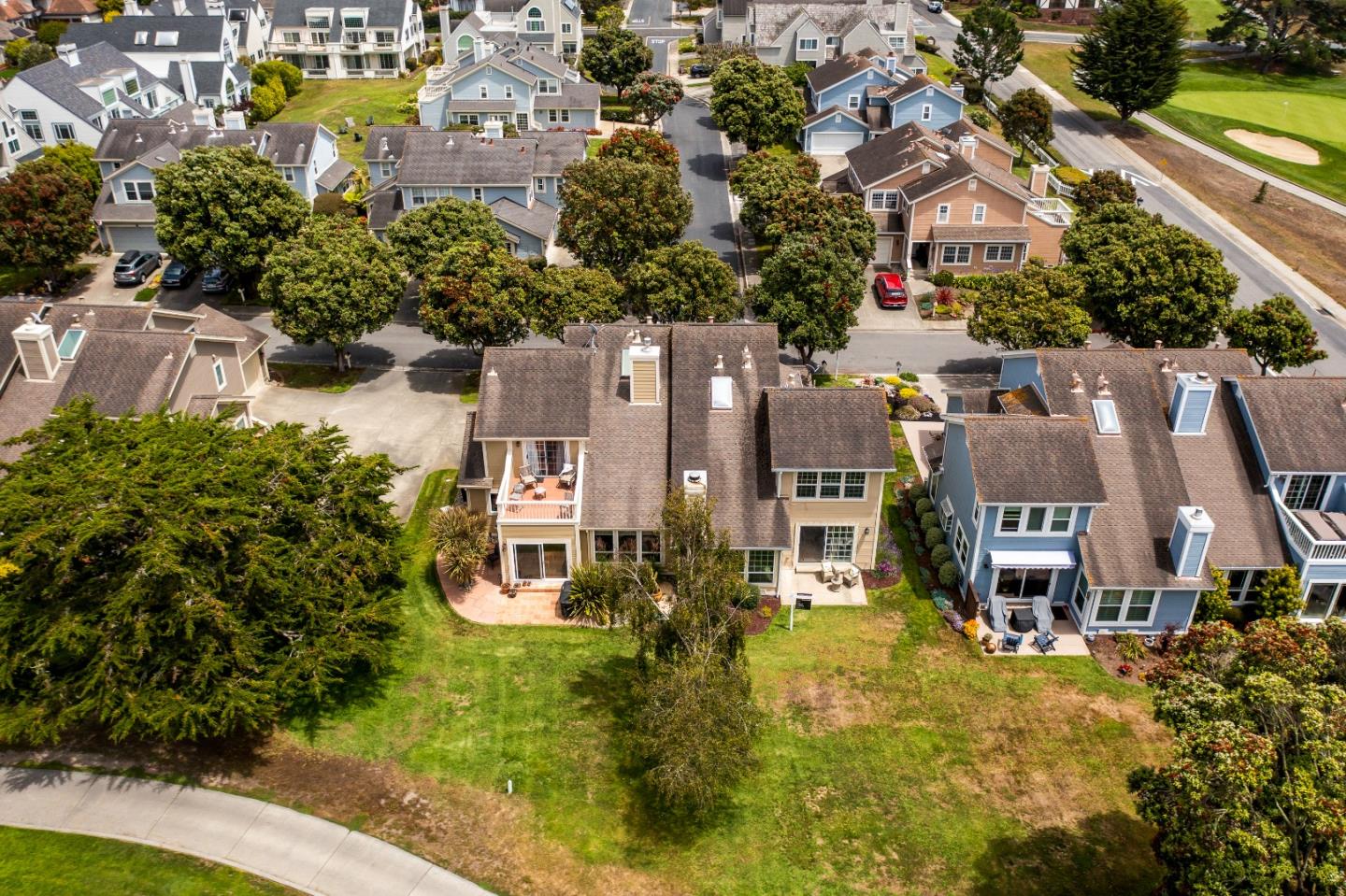 6 Muirfield Road Half Moon Bay, CA 94019 - Photo 23 of 25 an aerial view of residential houses with outdoor space and trees