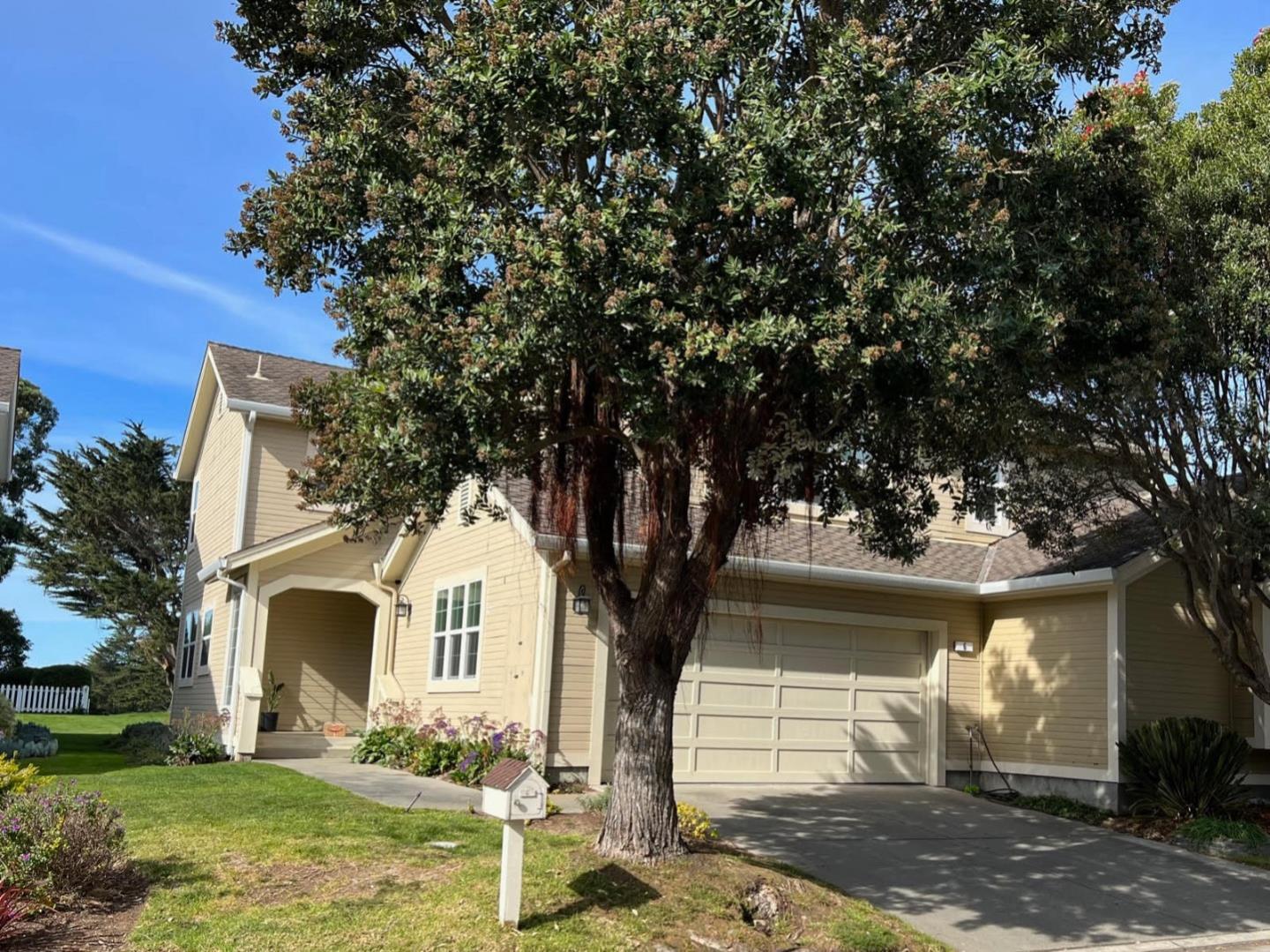 6 Muirfield Road Half Moon Bay, CA 94019 - Photo 25 of 25 a white house with tree in the background