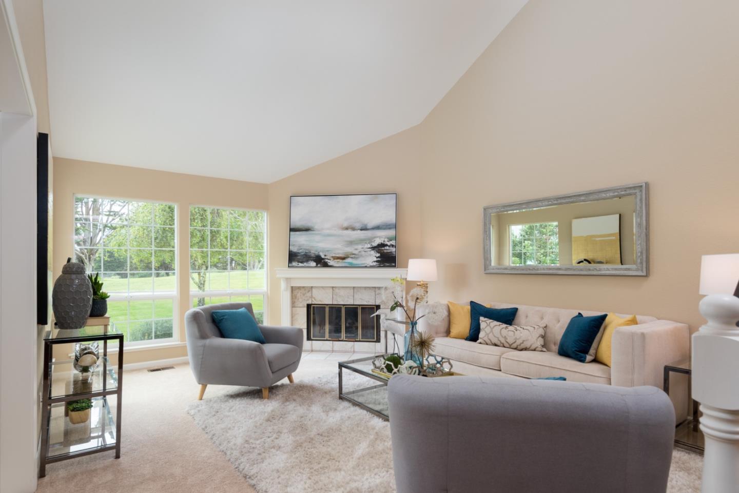 6 Muirfield Road Half Moon Bay, CA 94019 - Photo 4 of 25 a living room with furniture large window and a fireplace