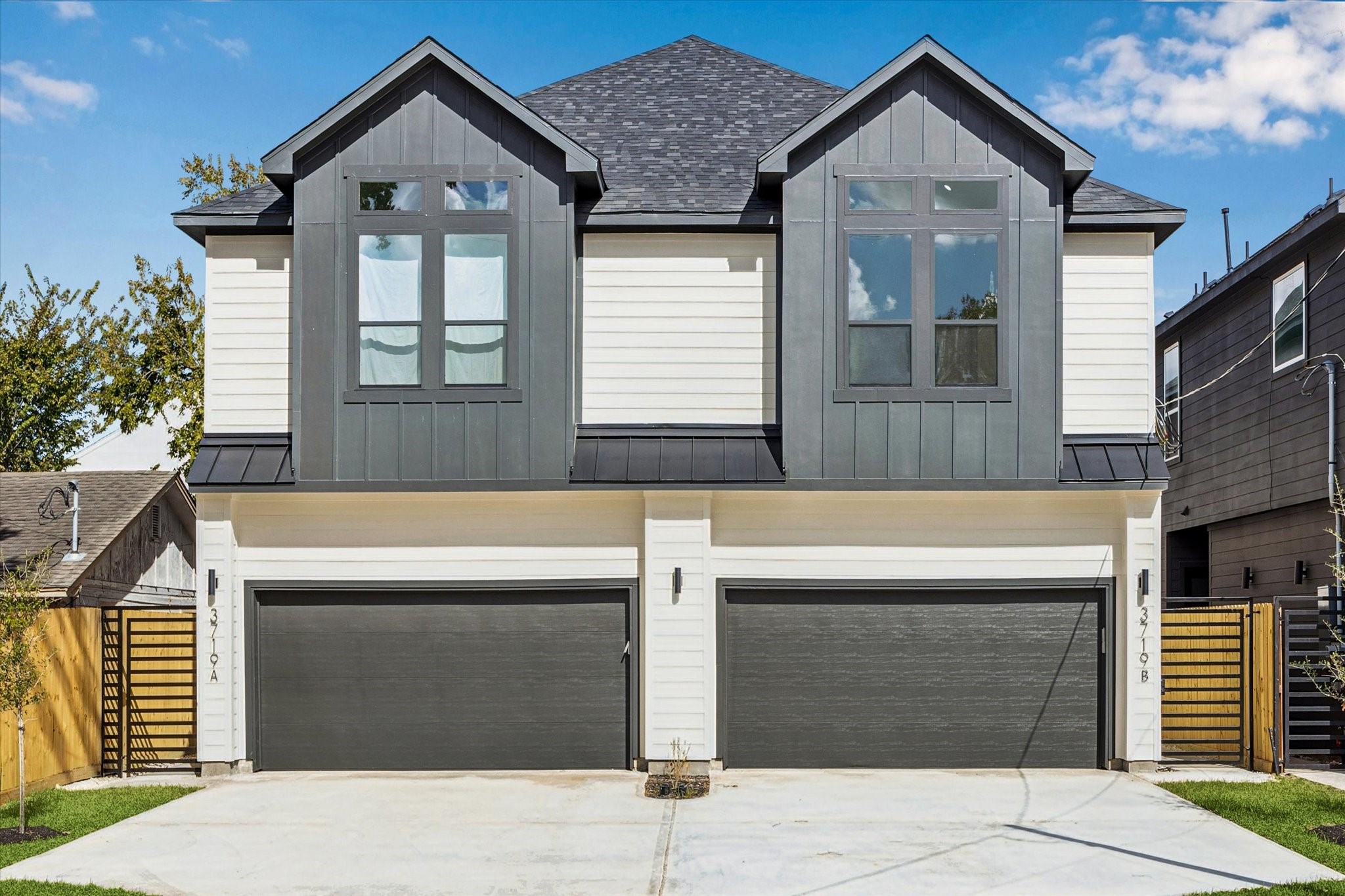 a front view of a house with a garage