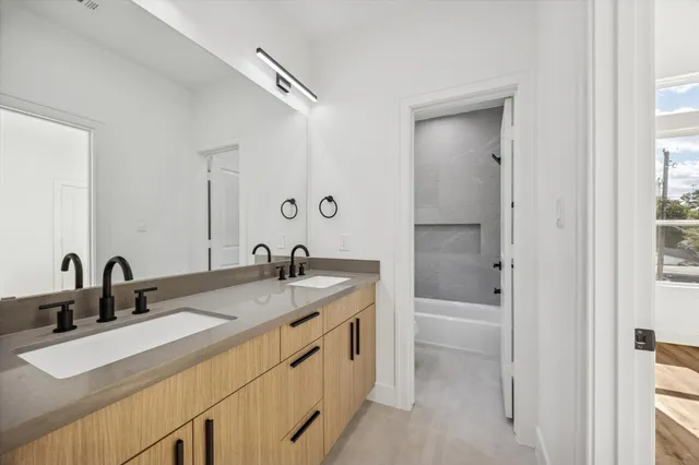 a view of hallway with wooden floor