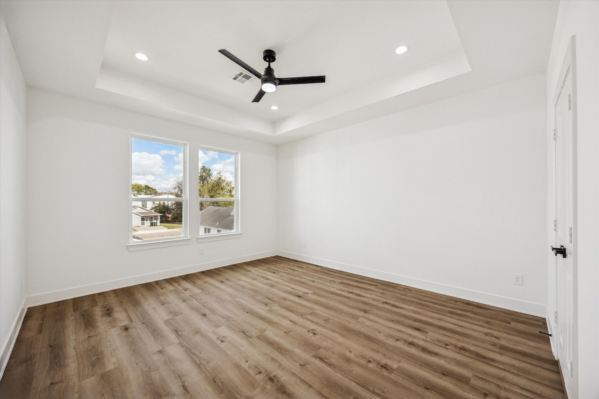 3719 Lydia Street, Unit B Houston, TX 77021 - Photo 8 of 20 wooden floor in an empty room with a window