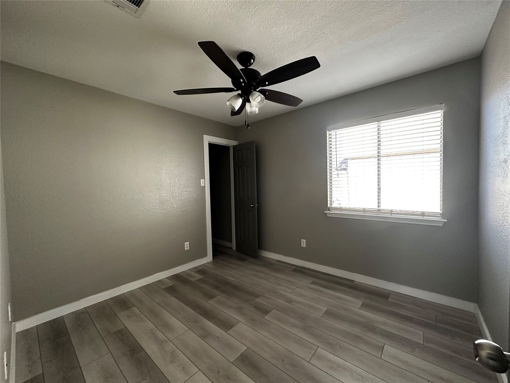 17733 Loch Linnhe Loop Pflugerville, TX 78660 - Photo 12 of 16 a view of room with window and ceiling fan