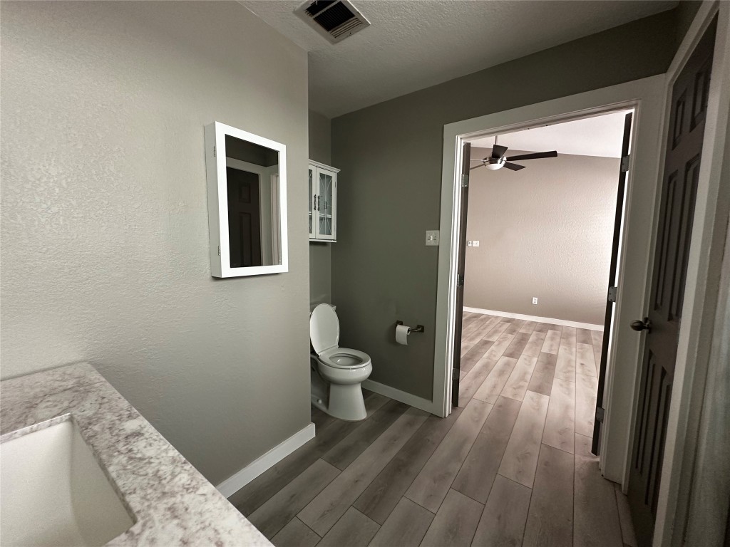 17733 Loch Linnhe Loop Pflugerville, TX 78660 - Photo 16 of 16 a bathroom with a toilet and a shower