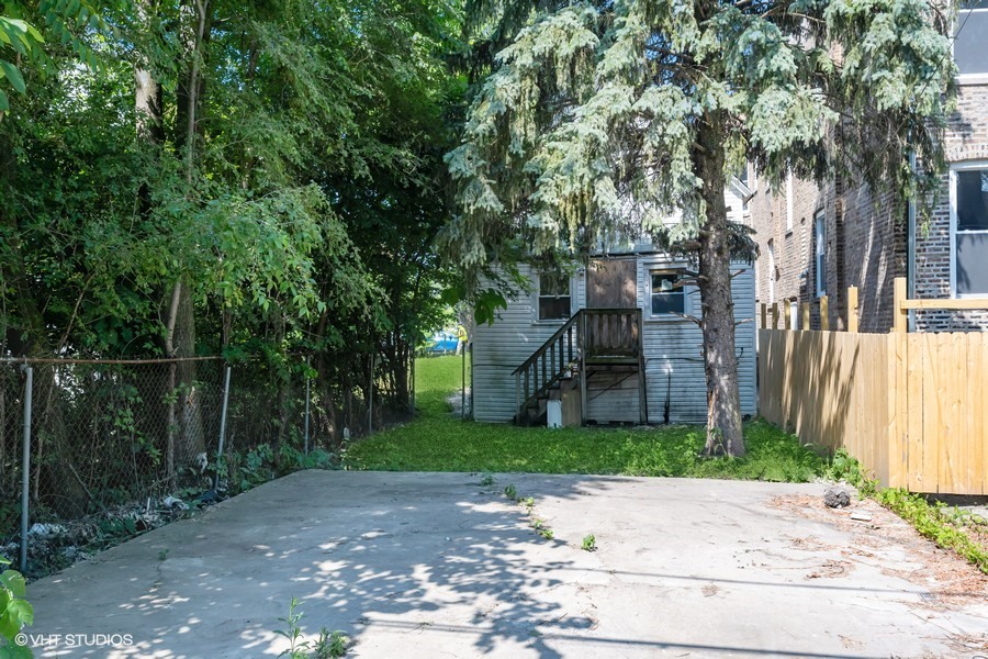 5943 South Aberdeen Street Chicago, IL 60621 - Photo 6 of 8 a view of a back yard