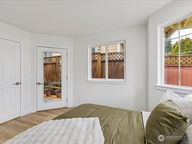 5104 154th Street Southwest Edmonds, WA 98026 - Photo 12 of 25 a bedroom with a bed and a window
