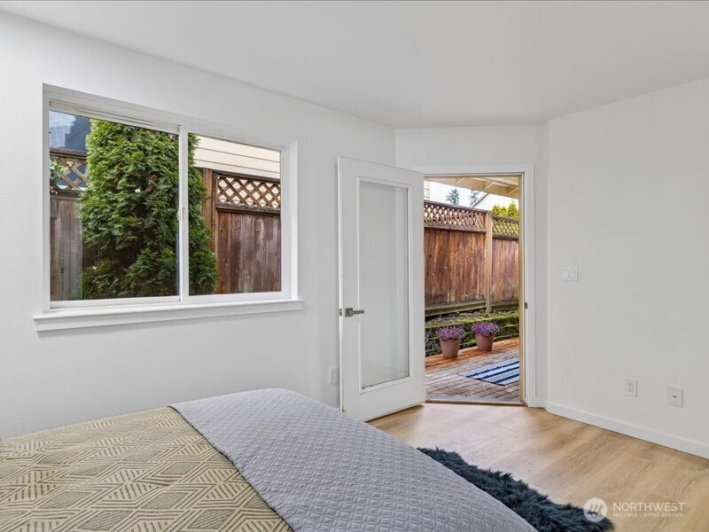 5104 154th Street Southwest Edmonds, WA 98026 - Photo 16 of 25 a bedroom with a bed and a window