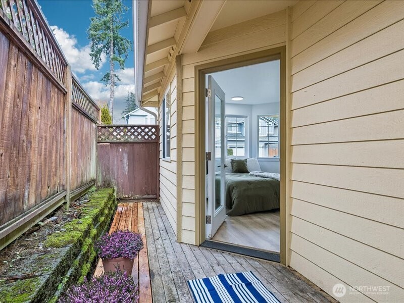 5104 154th Street Southwest Edmonds, WA 98026 - Photo 17 of 25 a view of a porch with wooden floor