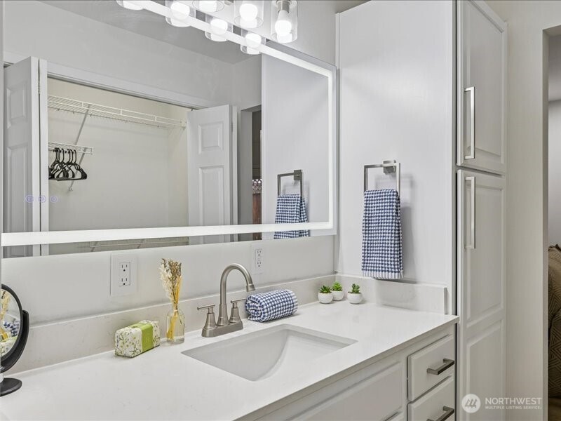5104 154th Street Southwest Edmonds, WA 98026 - Photo 20 of 25 a bathroom with a sink and a mirror