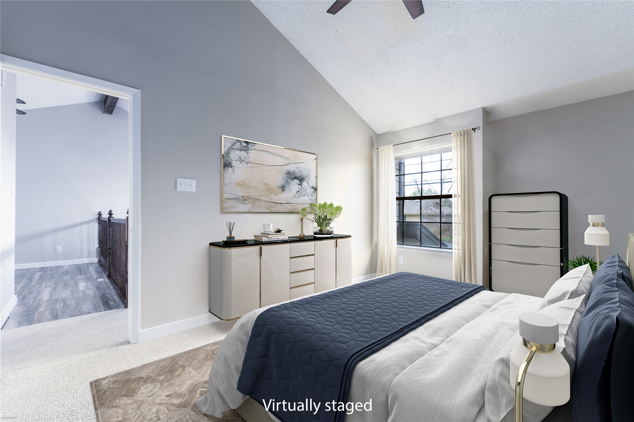 1748 Ohlen Road, Unit 3 Austin, TX 78757 - Photo 11 of 30 Upstairs primary bedroom with dramatic vaulted beamed ceiling