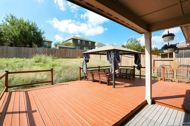 a view of swimming pool with seating area