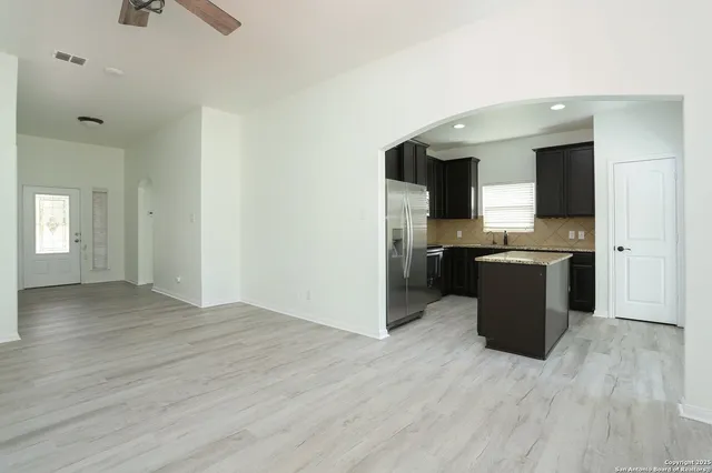 a view of kitchen with wooden floor