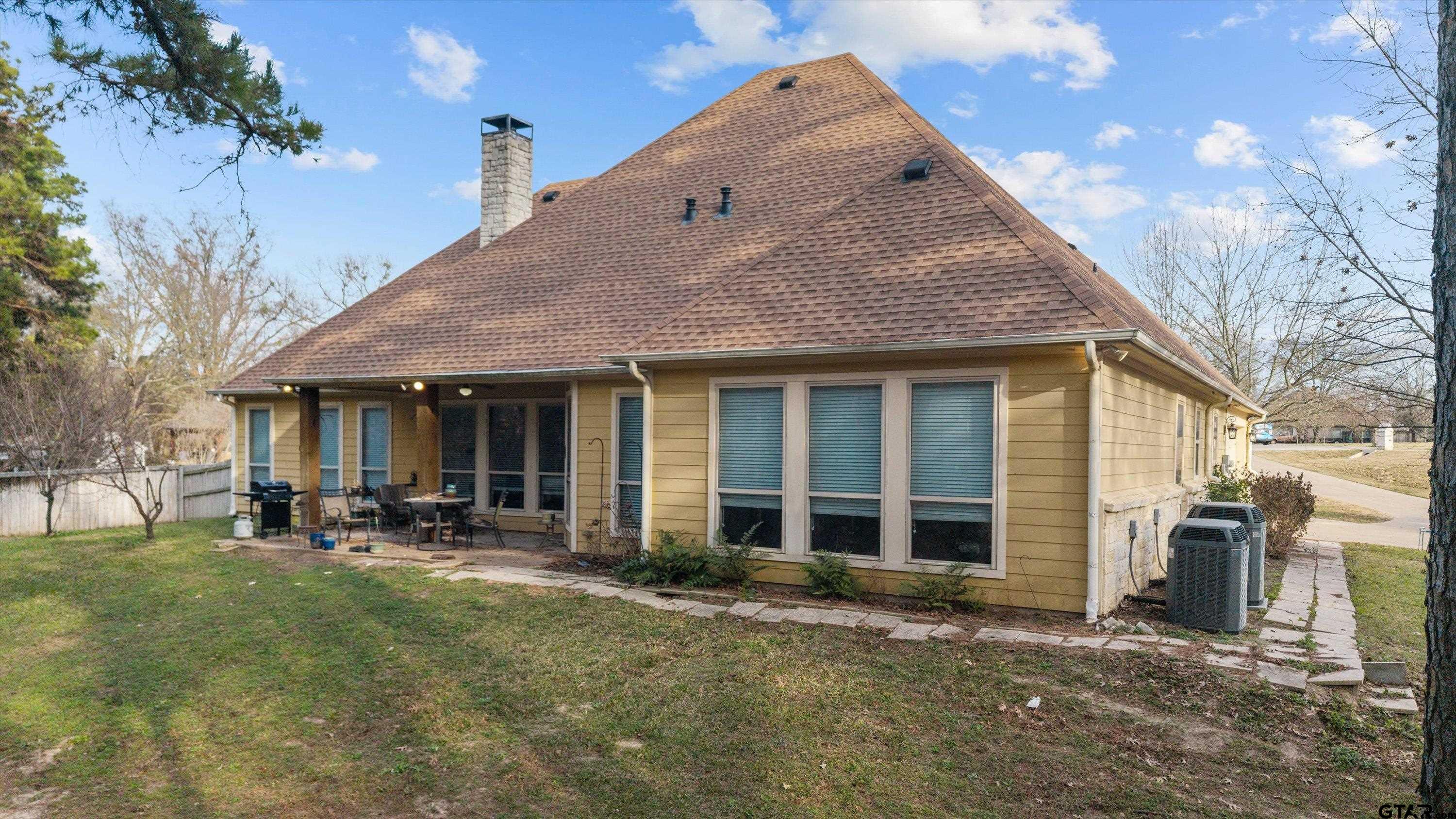 12170 Copper Court Tyler, TX 75706 - Photo 7 of 35 a front view of a house with sitting area