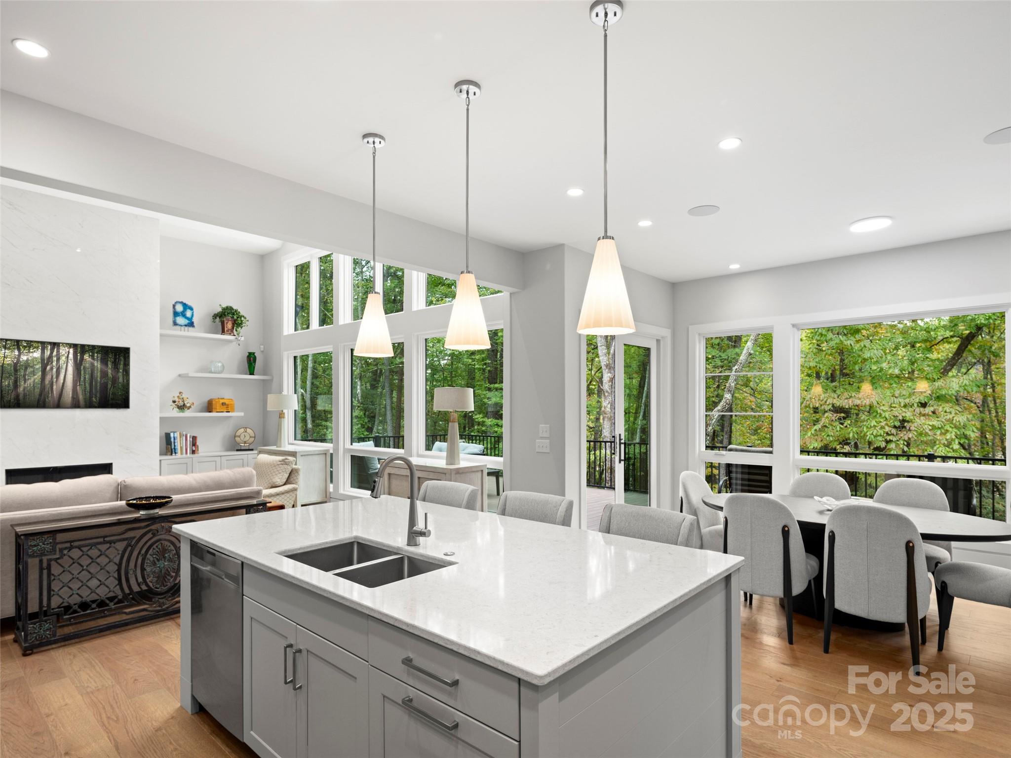 1565 Country View Way Arden, NC 28704 - Photo 11 of 31 a open kitchen with stainless steel appliances granite countertop a sink a stove and a wooden floors