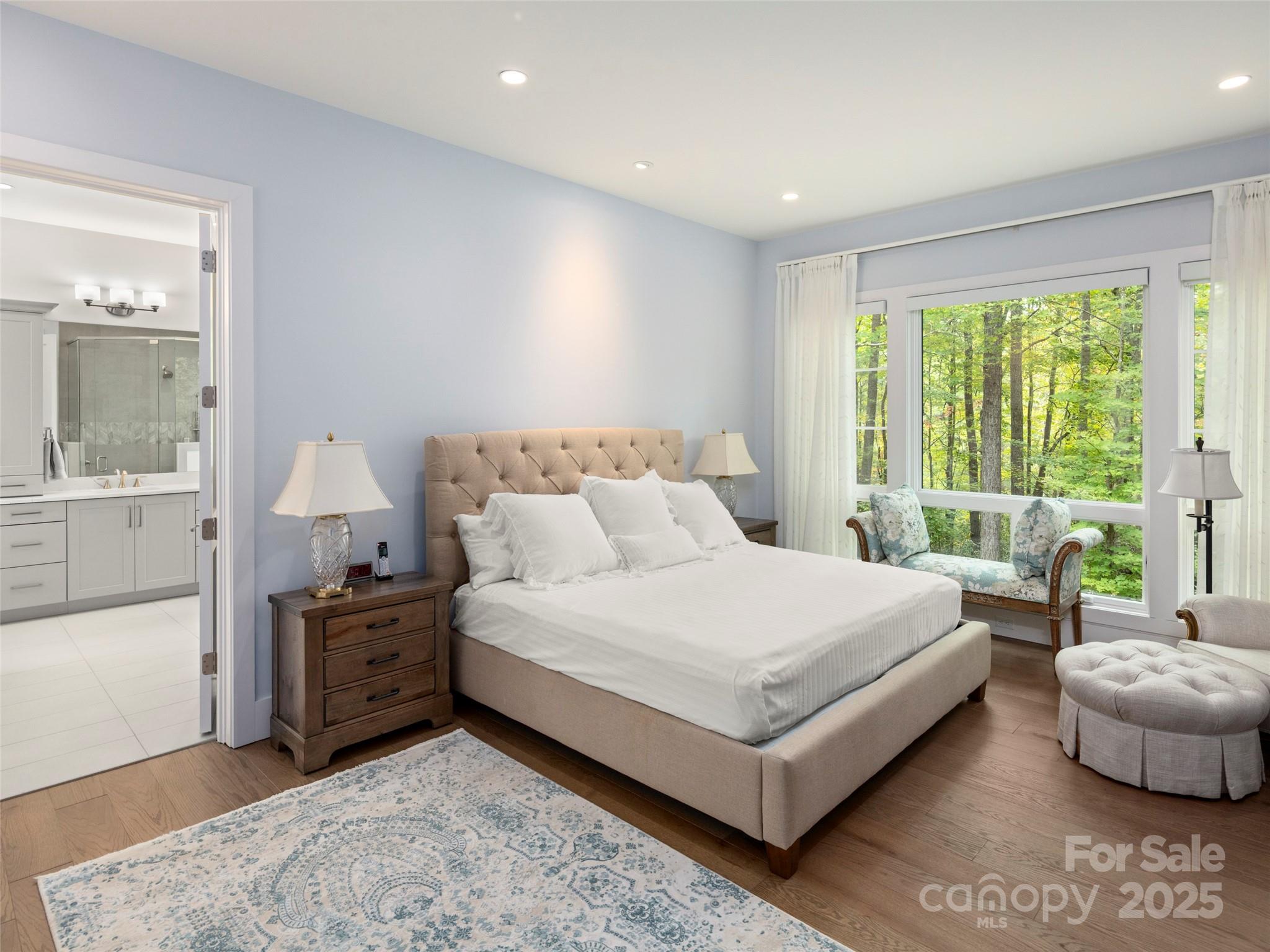 1565 Country View Way Arden, NC 28704 - Photo 20 of 31 a bedroom with a bed and a couch