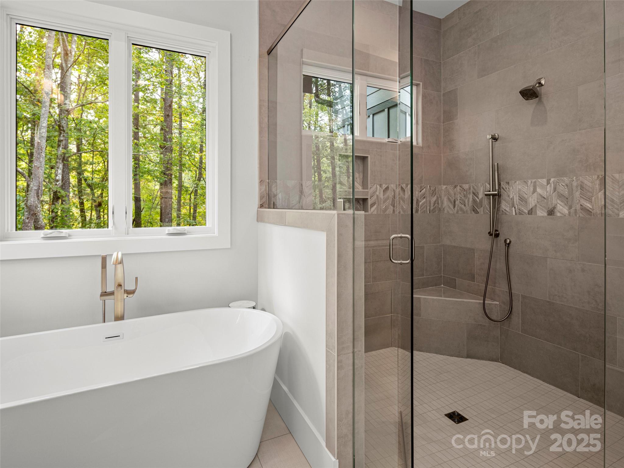 1565 Country View Way Arden, NC 28704 - Photo 23 of 31 a white bath tub sitting next to a shower