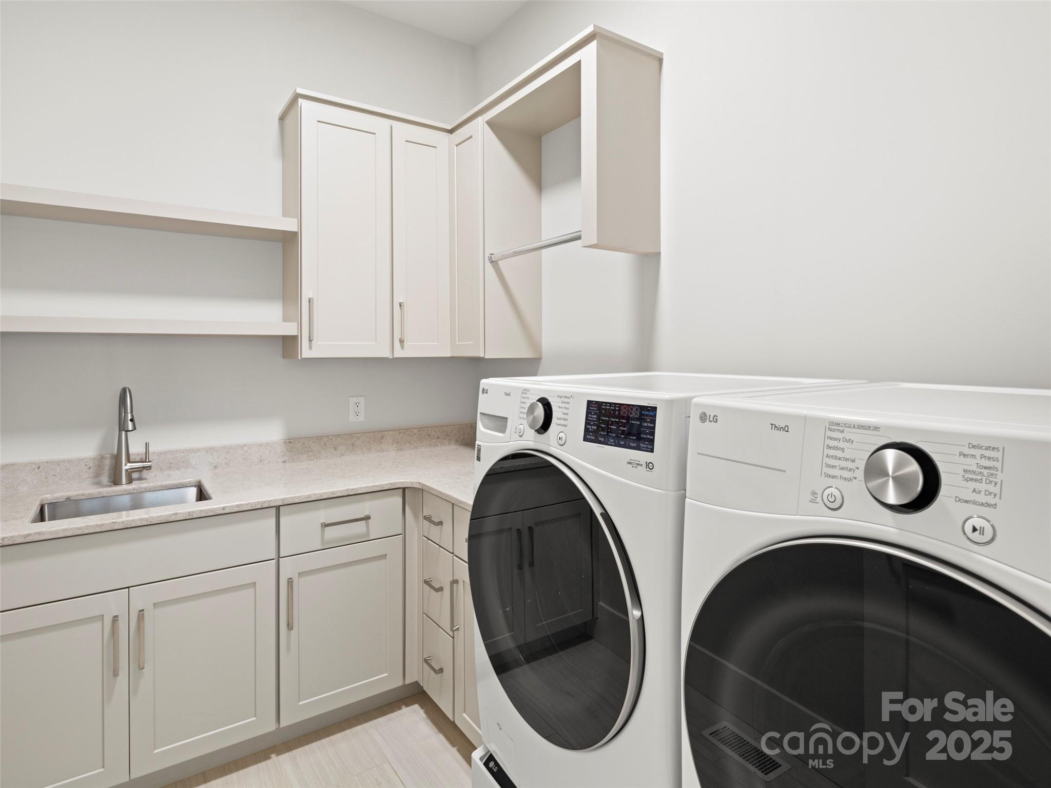 1565 Country View Way Arden, NC 28704 - Photo 28 of 31 a utility room with dryer and washer