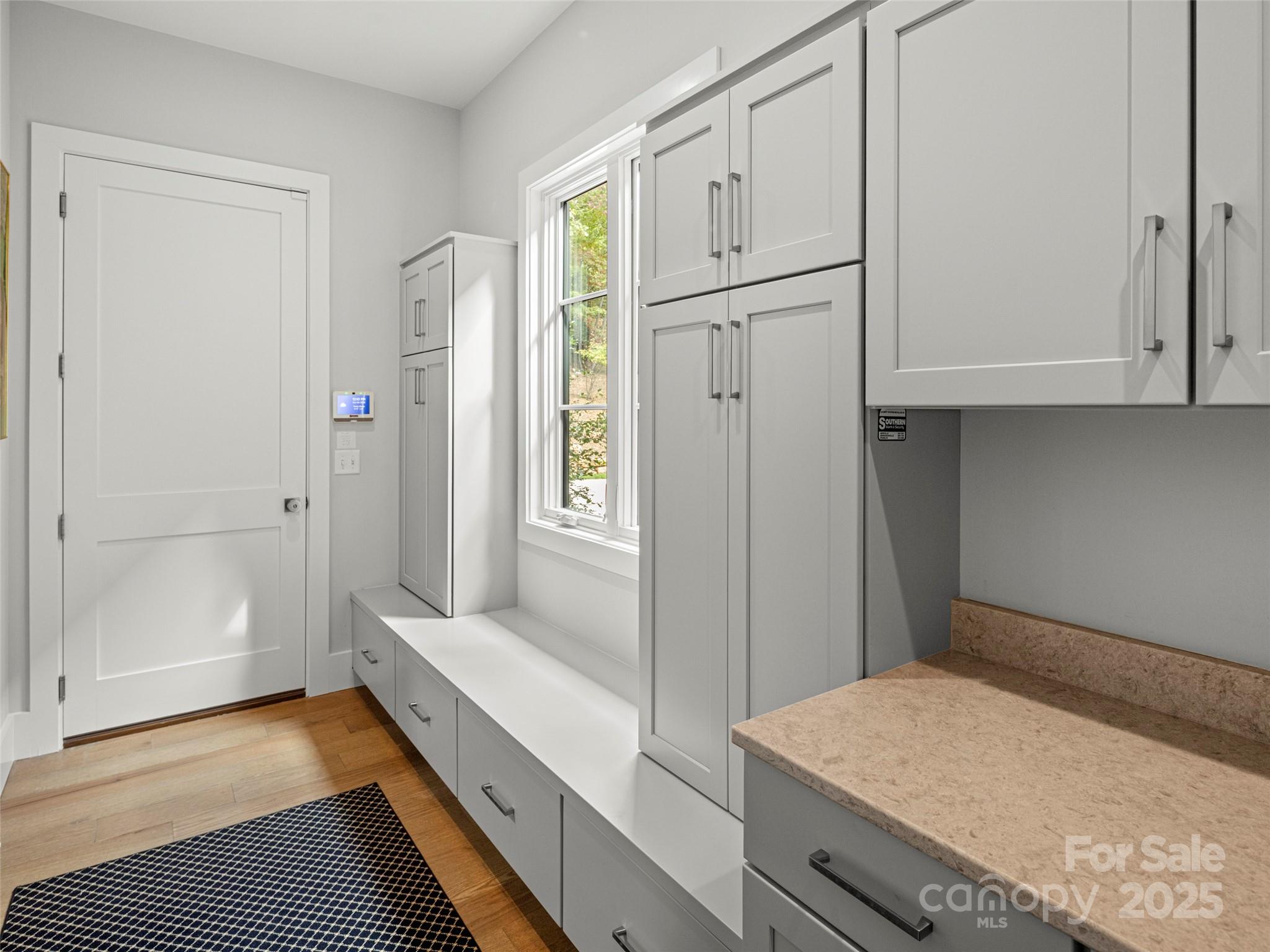 1565 Country View Way Arden, NC 28704 - Photo 29 of 31 a bathroom with a sink and a mirror