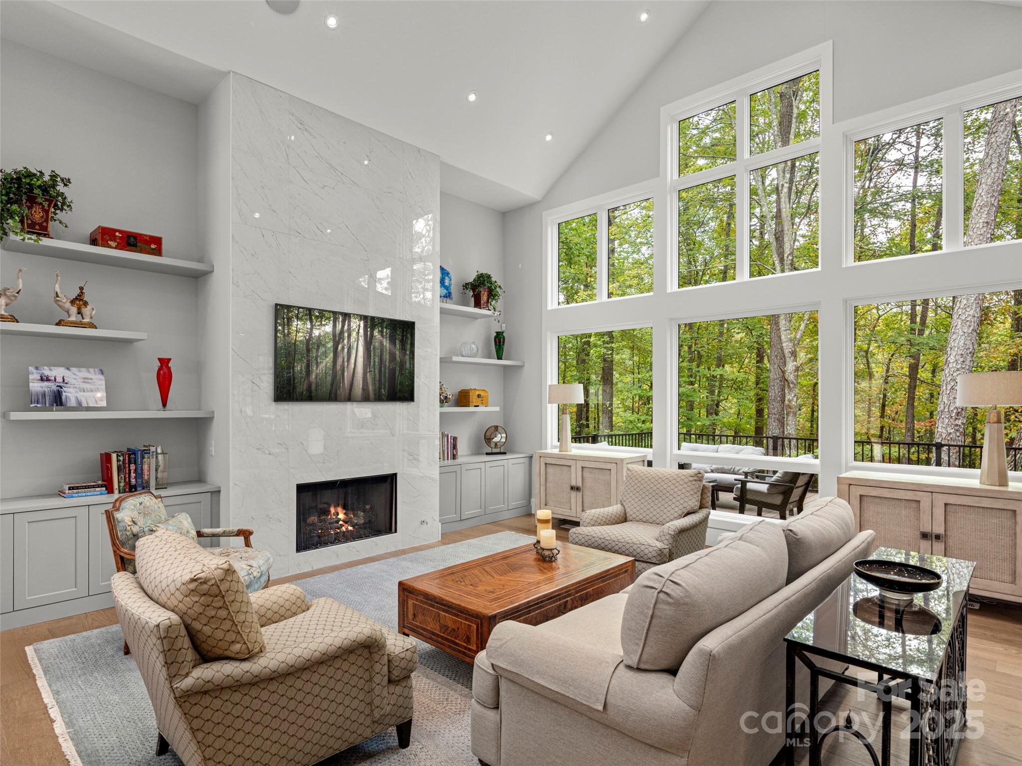 1565 Country View Way Arden, NC 28704 - Photo 5 of 31 a living room with furniture fireplace and a window