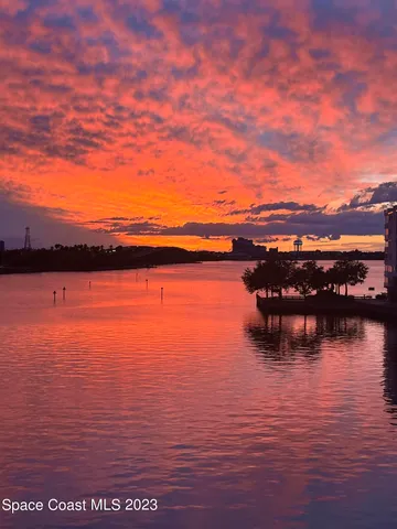 a view of an ocean with city