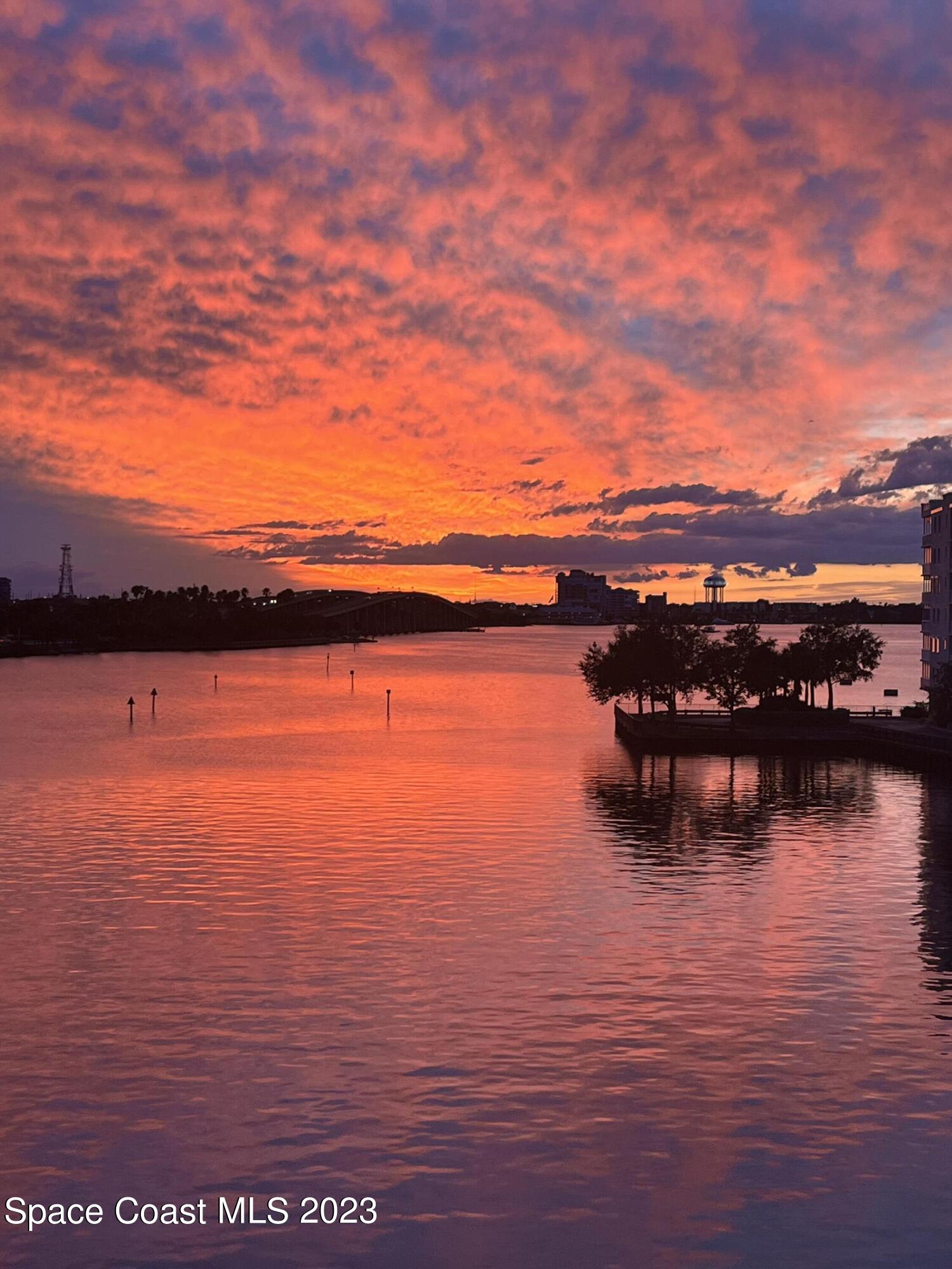 a view of an ocean with city