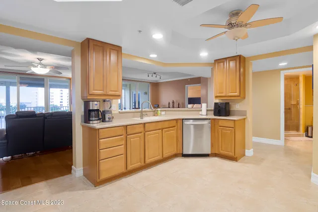 a kitchen with a refrigerator sink and microwave