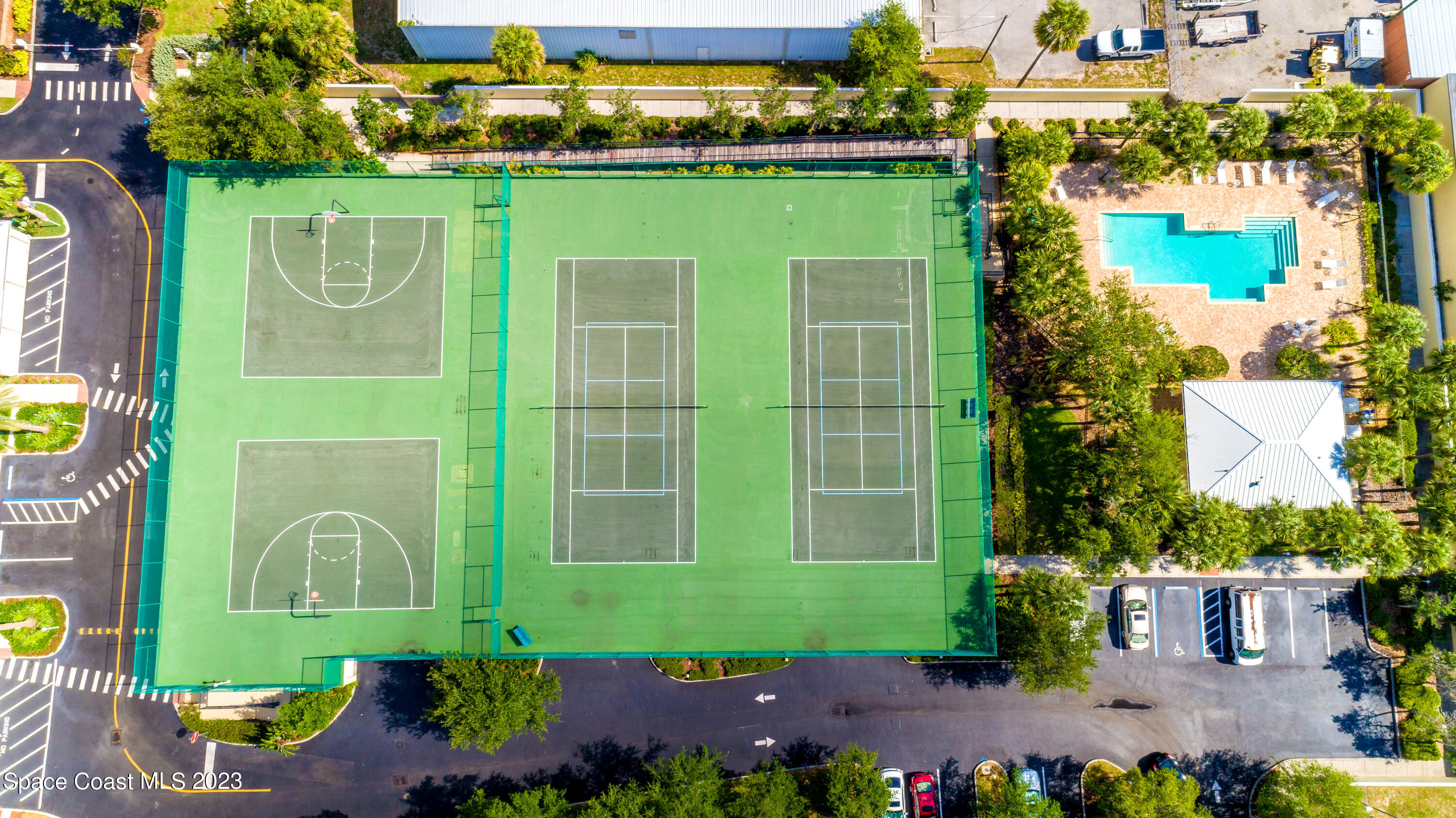134 Starboard Lane, Unit 306 Merritt Island, FL 32953 - Photo 38 of 42 a front view of a house with a garden
