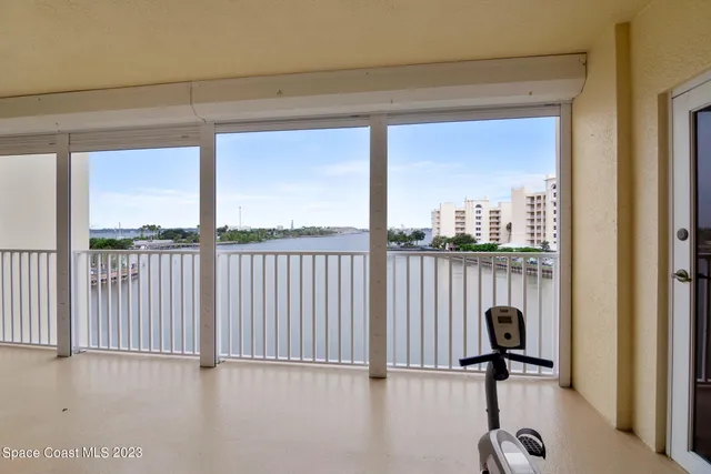 a view of balcony with furniture
