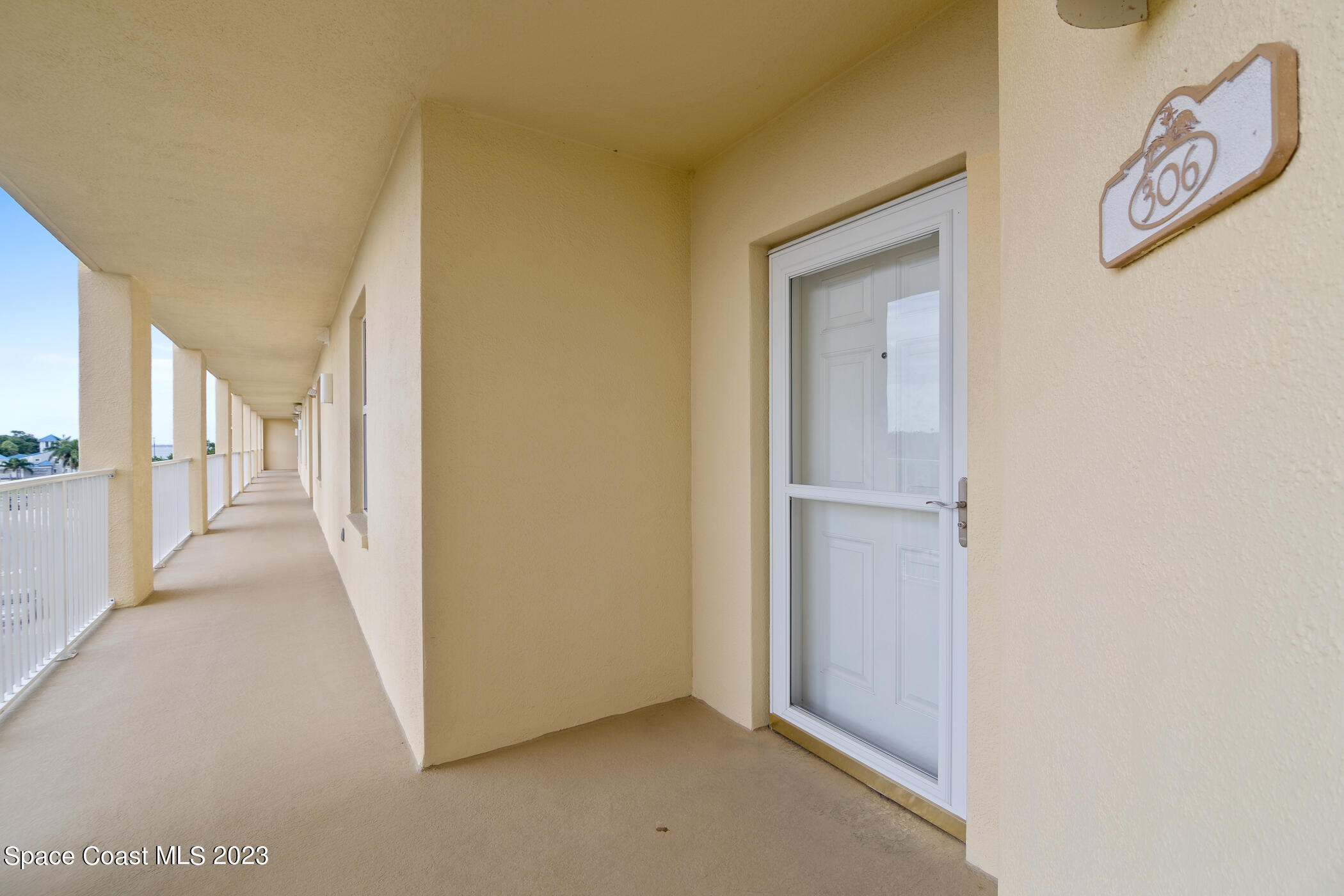 134 Starboard Lane, Unit 306 Merritt Island, FL 32953 - Photo 5 of 42 a view of a hallway with closet area