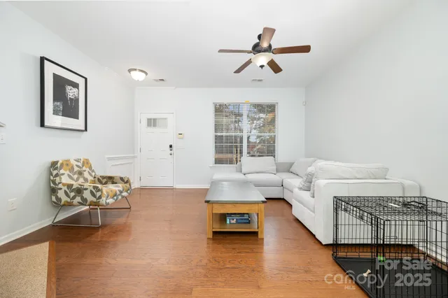 a spacious bedroom with a bed and a couch