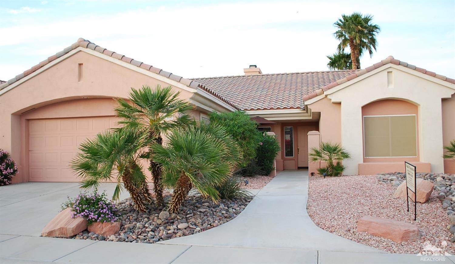 78082 Hunter Point Road Palm Desert, CA 92211 - Photo 1 of 38 a view of a house with a patio