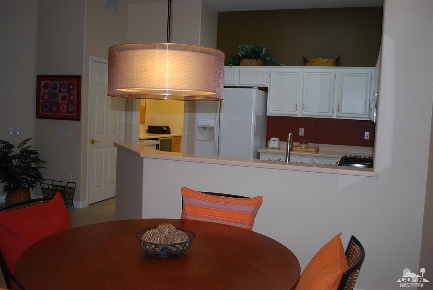 78082 Hunter Point Road Palm Desert, CA 92211 - Photo 16 of 38 a workspace with furniture and window