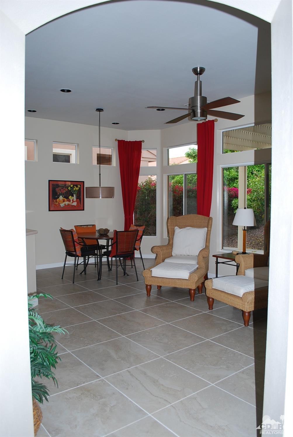 78082 Hunter Point Road Palm Desert, CA 92211 - Photo 10 of 38 a outdoor space with a large window and furniture