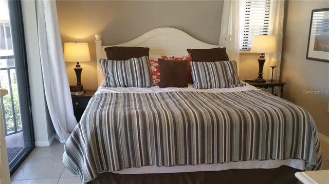 a bathroom with a sink double vanity and a mirror