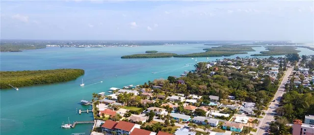 a view of a pathway with a yard