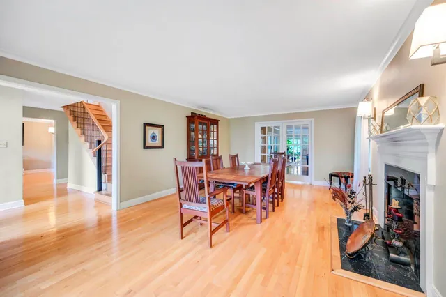 a view of entryway with wooden floor and a potted plant