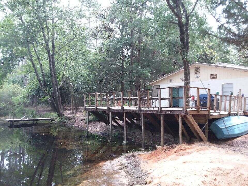 3938 Fern Barrow Road Crestview, FL 32539 - Photo 7 of 24 Durable Deck on the water