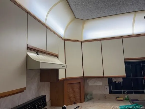 a room with storage and utility