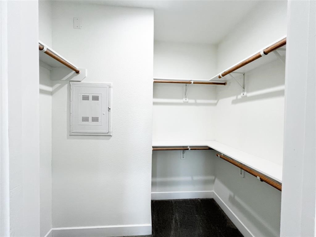 144 West 5th Street, Unit B Kemah, TX 77565 - Photo 13 of 22 a view of an empty walk in closet
