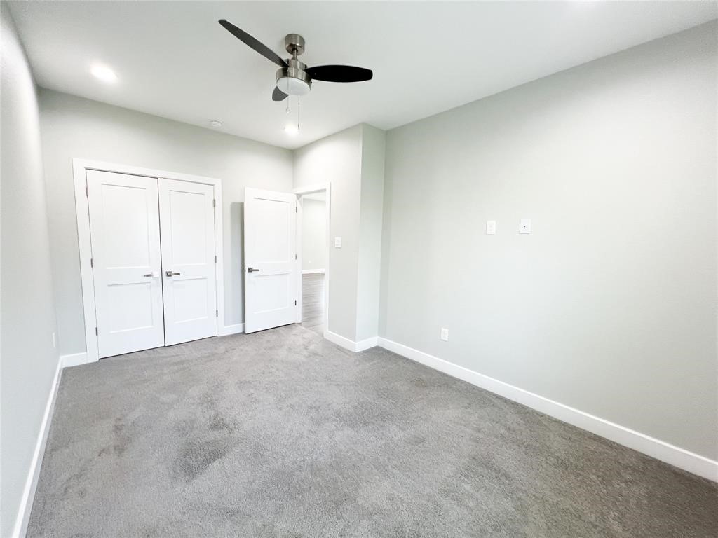144 West 5th Street, Unit B Kemah, TX 77565 - Photo 18 of 22 an empty room with an entryway and closet area
