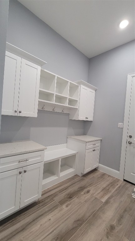 9729 Neuens Road Houston, TX 77080 - Photo 14 of 34 a view of cabinets and wooden floor