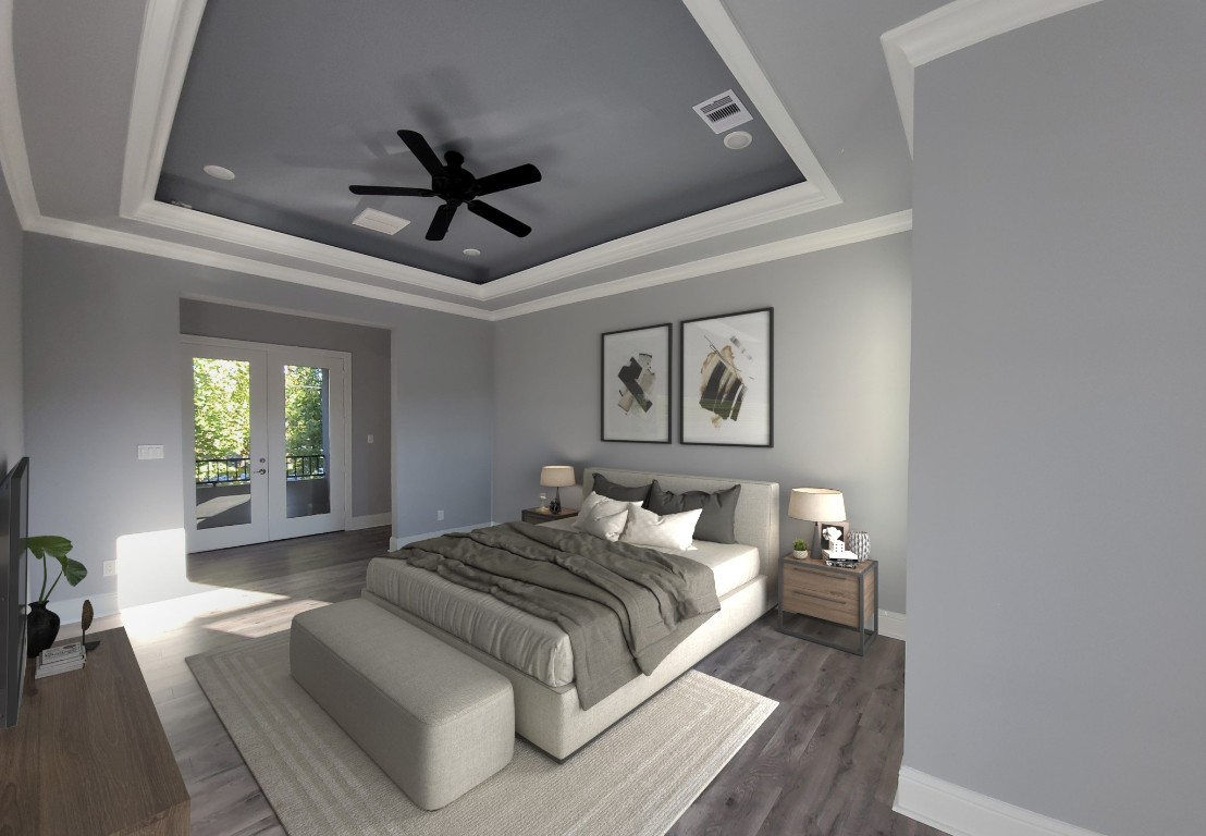 9729 Neuens Road Houston, TX 77080 - Photo 23 of 34 a spacious bedroom with a bed and a chandelier